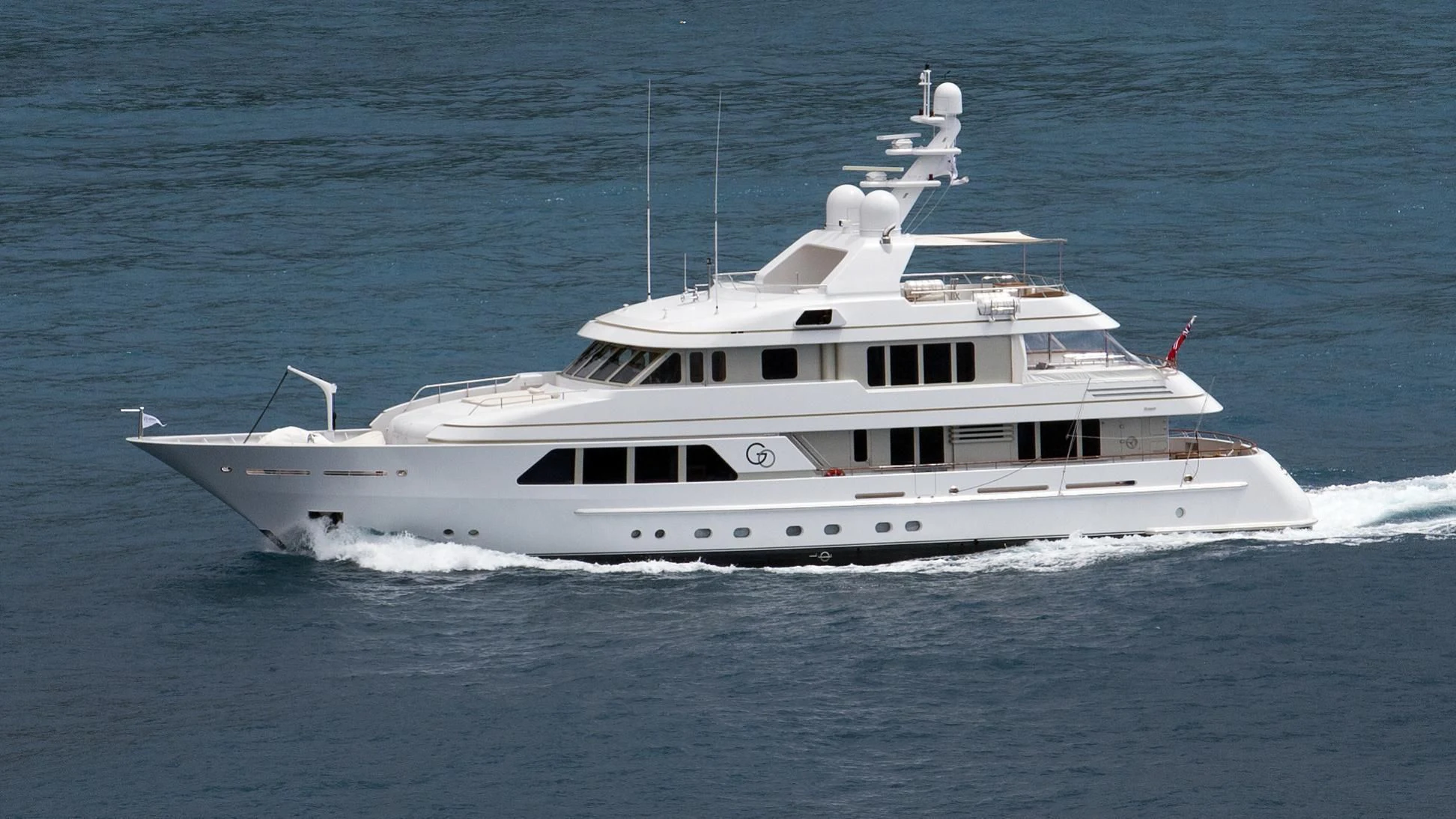 a white yacht in the water aboard GO Yacht for Sale
