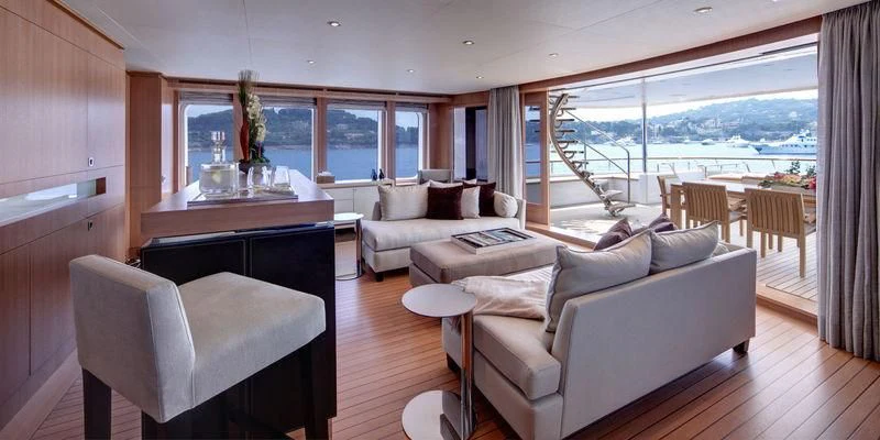 a living room with a large window aboard GO Yacht for Sale