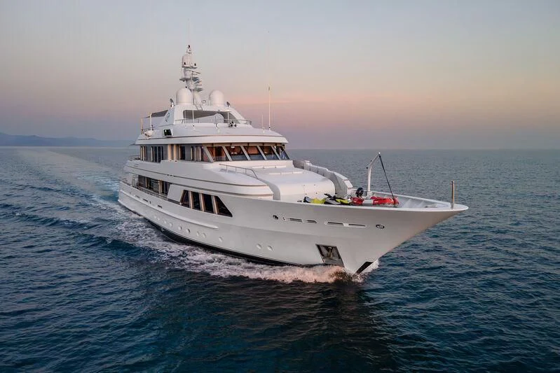 a large white boat on the water aboard GO Yacht for Sale