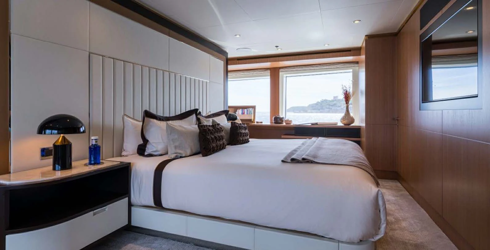 a bed in a room aboard GO Yacht for Sale