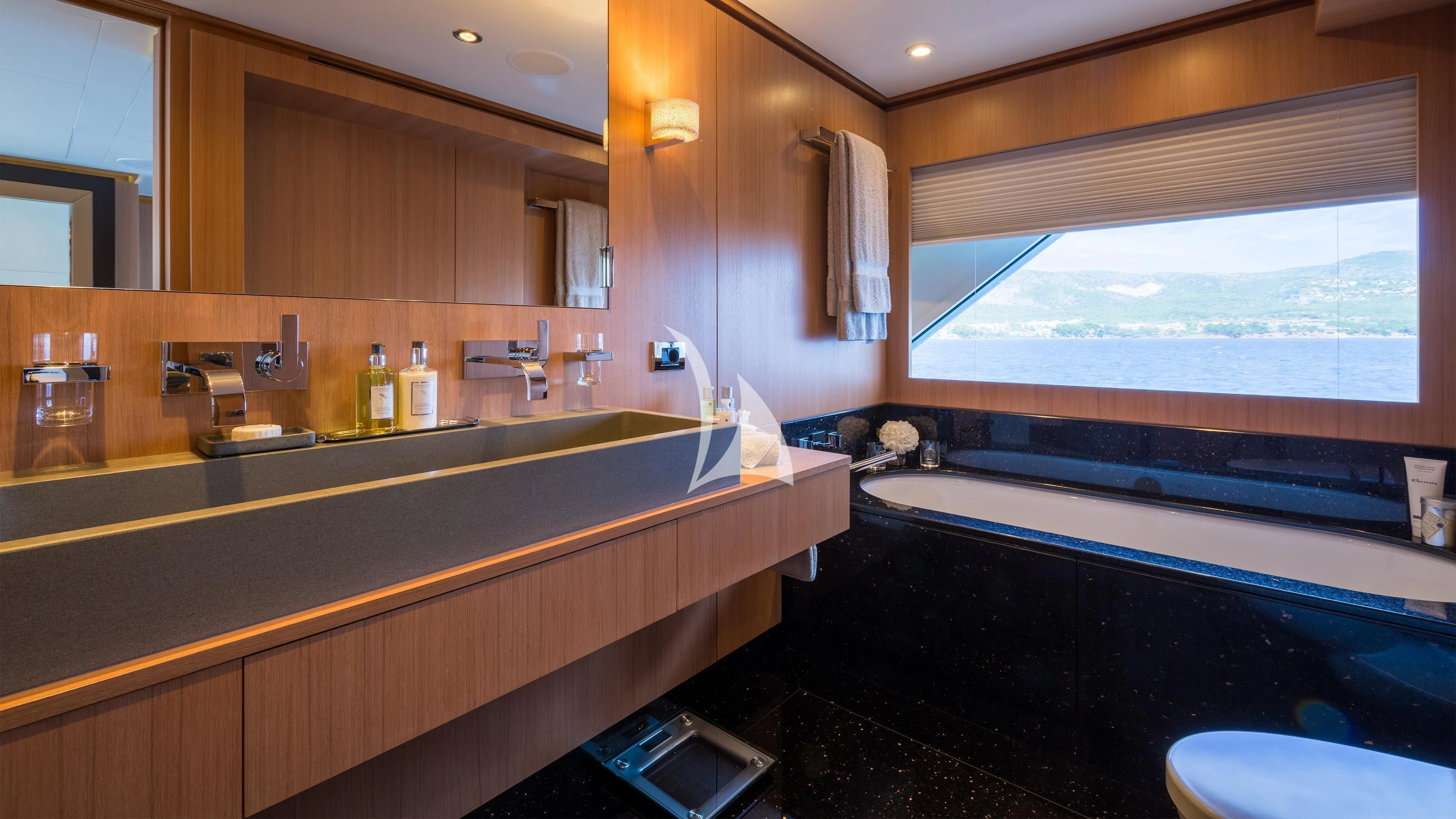 a bathroom with a large tub aboard GO Yacht for Sale