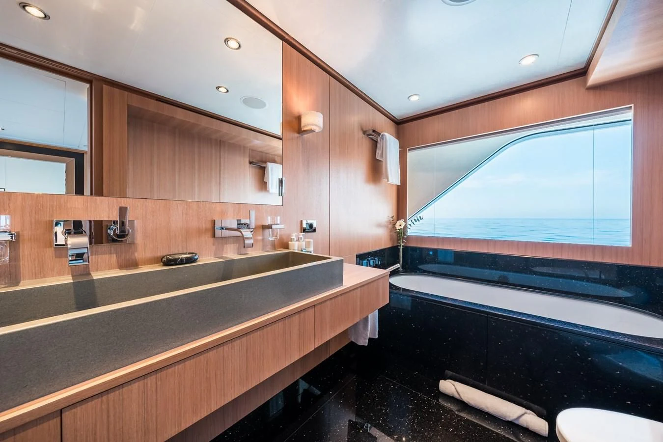 a bathroom with a large tub aboard GO Yacht for Sale
