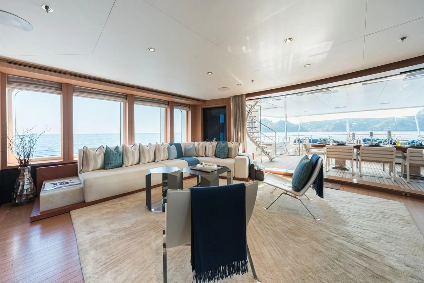 a living room with a large window aboard GO Yacht for Sale