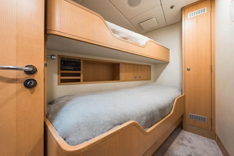 a bed with a vent on the top aboard GO Yacht for Sale
