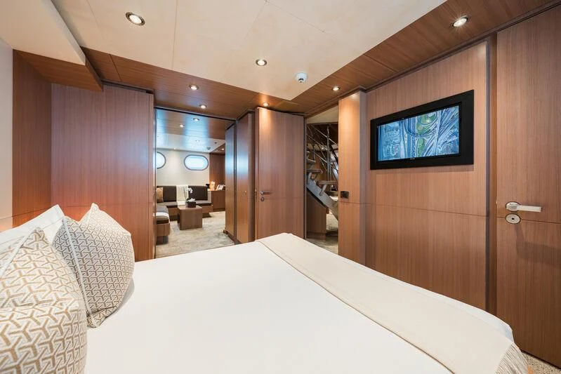 a hotel room with a bed aboard GO Yacht for Sale