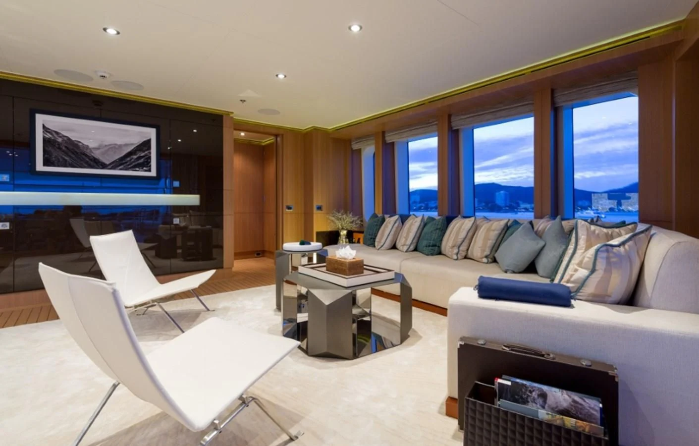 a living room with a couch and a tv aboard GO Yacht for Sale