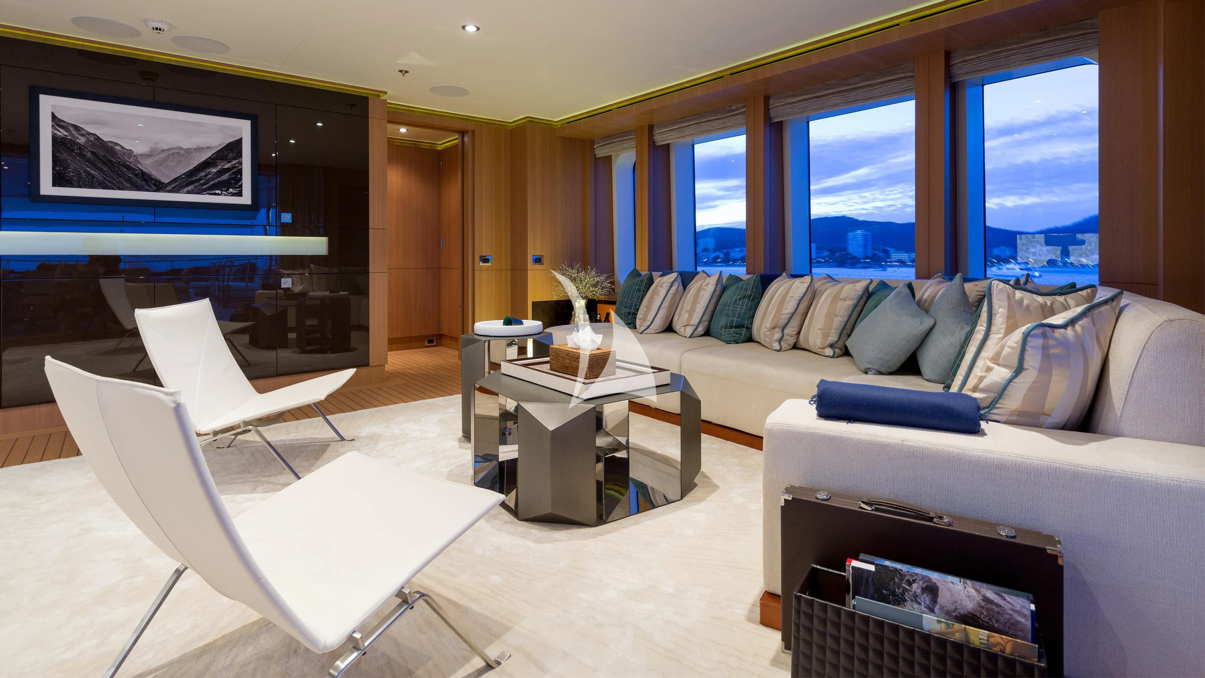 a living room with a couch and a coffee table aboard GO Yacht for Sale