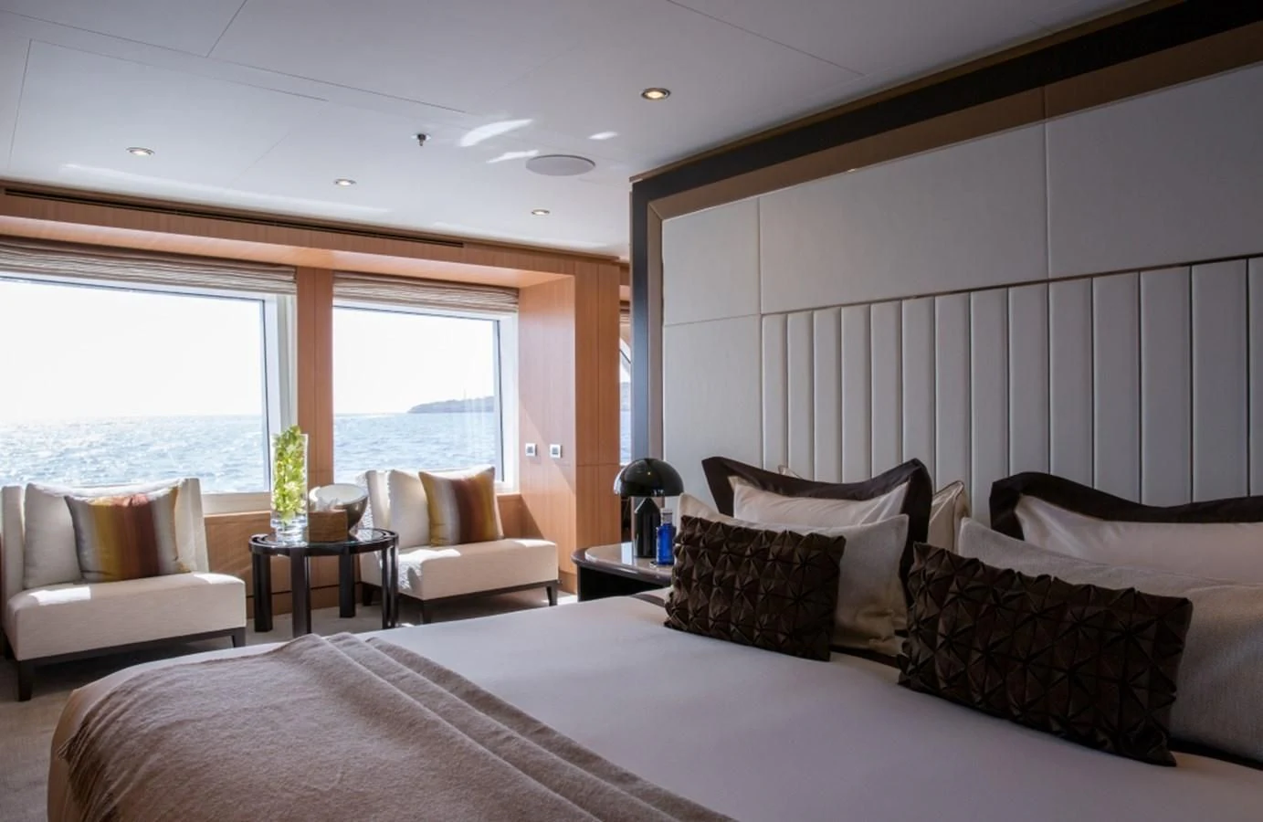 a large bed in a room aboard GO Yacht for Sale