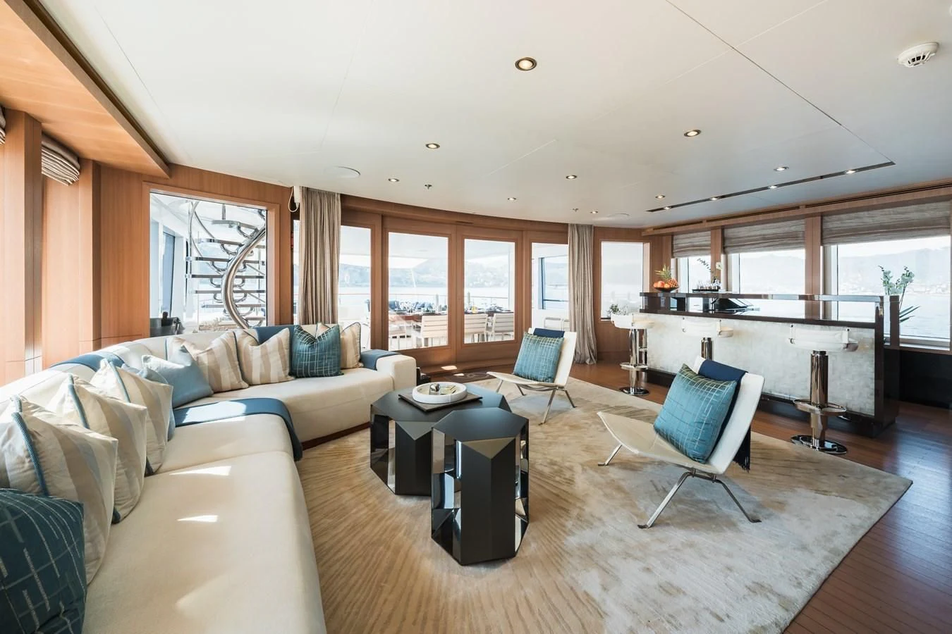 a living room with a large window aboard GO Yacht for Sale