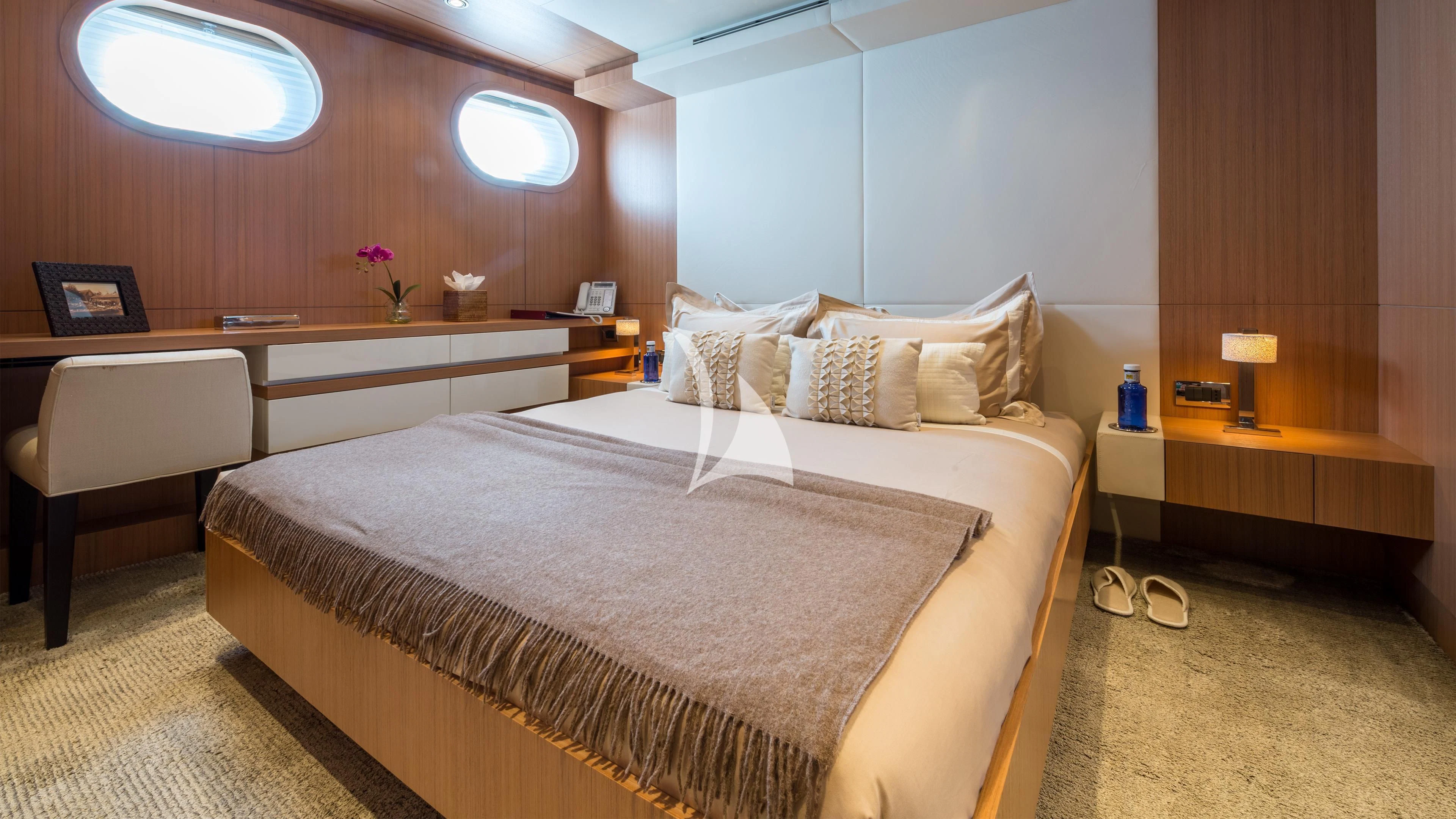 a bed in a hotel room aboard GO Yacht for Sale