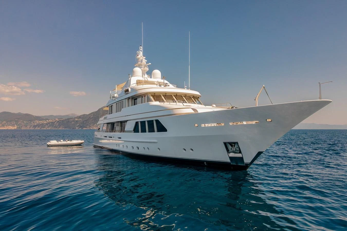 a large white boat in the water aboard GO Yacht for Sale