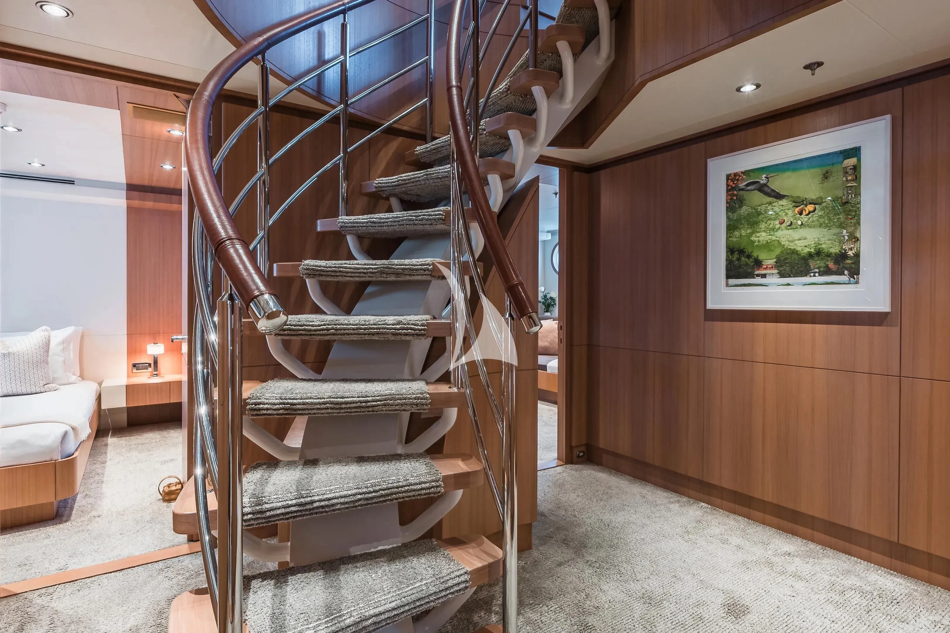 a spiral staircase in a house aboard GO Yacht for Sale
