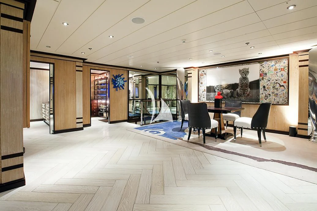 a room with a table and chairs aboard FORCE BLUE Yacht for Charter