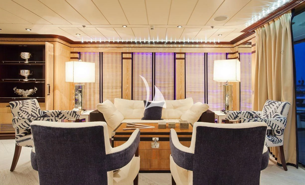 a living room with a couch and a table aboard FORCE BLUE Yacht for Charter