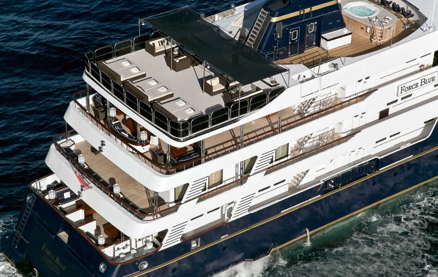 a large ship in the water aboard FORCE BLUE Yacht for Charter
