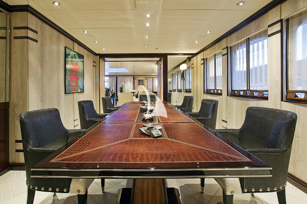 a conference room with a table and chairs aboard FORCE BLUE Yacht for Charter