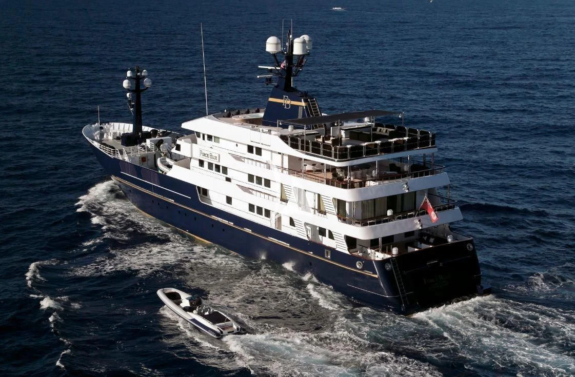 a large ship on the water aboard FORCE BLUE Yacht for Charter