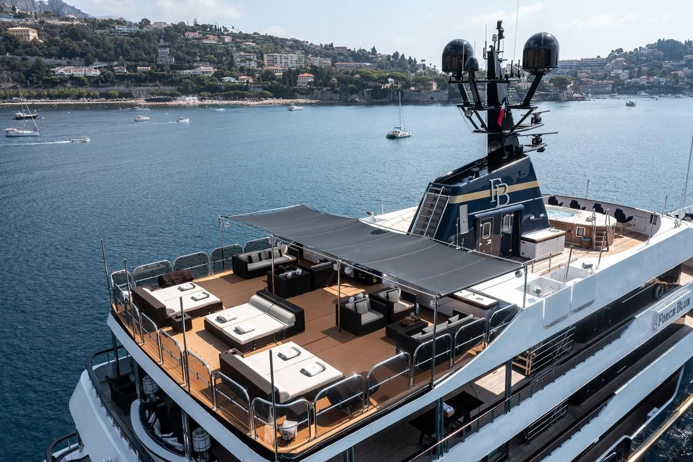 a large ship in the water aboard FORCE BLUE Yacht for Charter