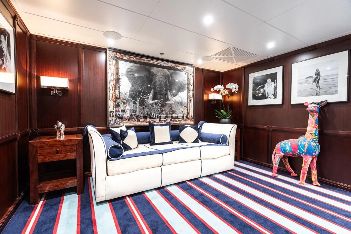 a room with a couch and a rug aboard FORCE BLUE Yacht for Charter