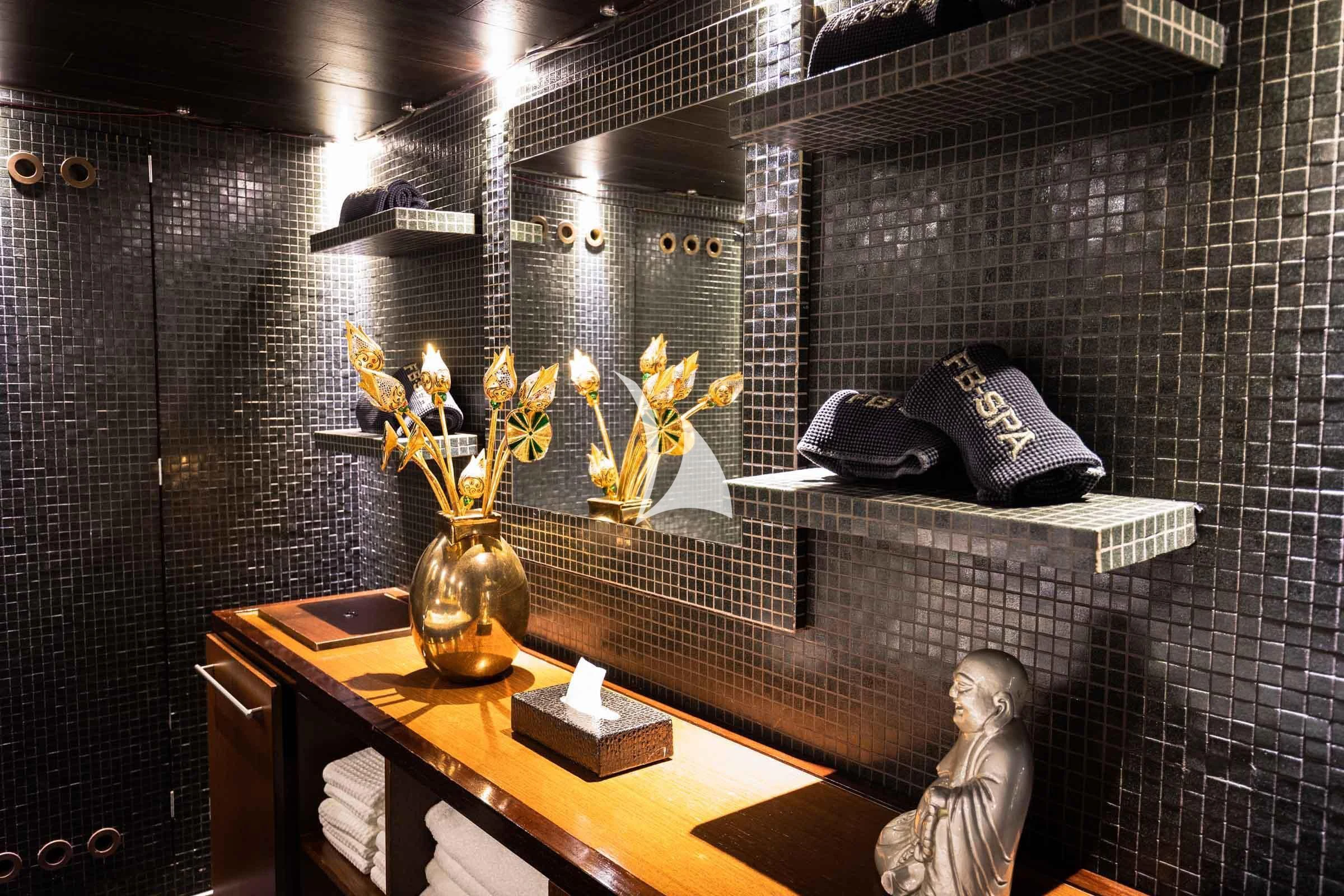 a display case with a statue aboard FORCE BLUE Yacht for Charter