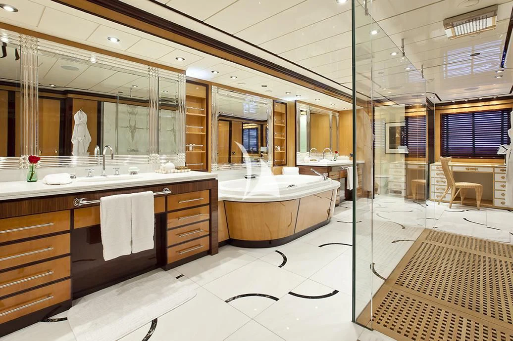 a large bathroom with a large mirror aboard FORCE BLUE Yacht for Charter