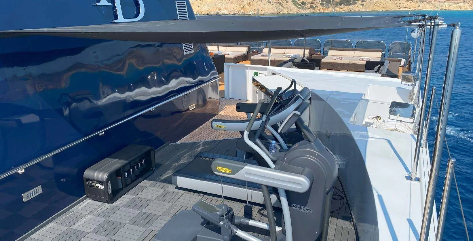 a large boat with many seats aboard FORCE BLUE Yacht for Charter