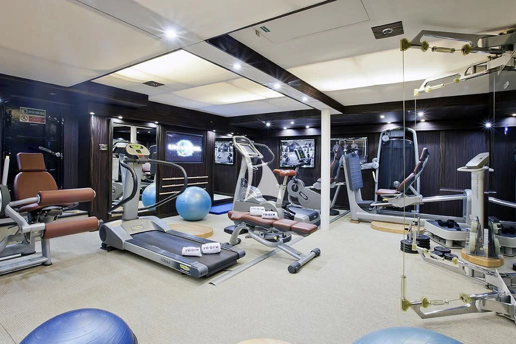 a room with exercise equipment aboard FORCE BLUE Yacht for Charter