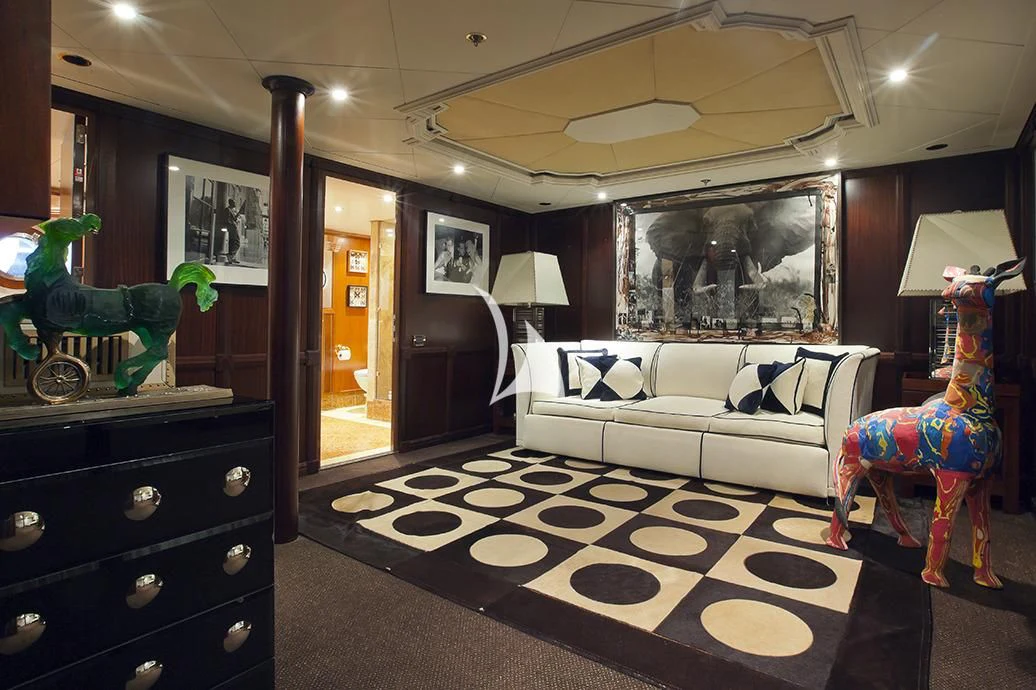 a room with a couch and a bed aboard FORCE BLUE Yacht for Charter