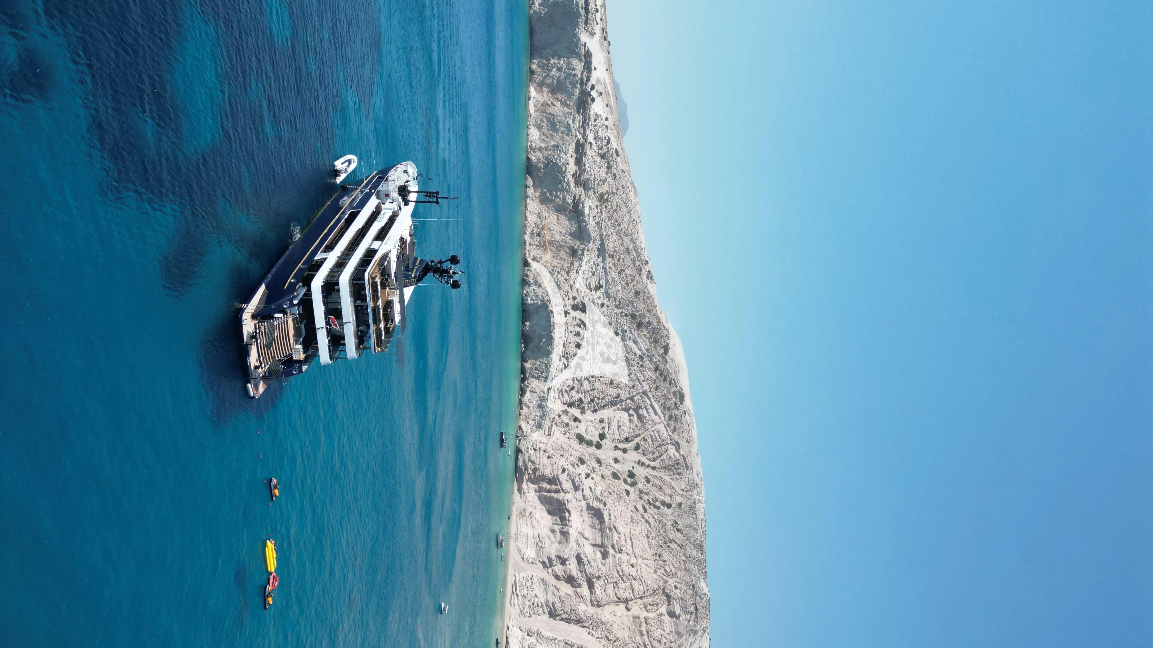 a person holding a drone aboard FORCE BLUE Yacht for Charter