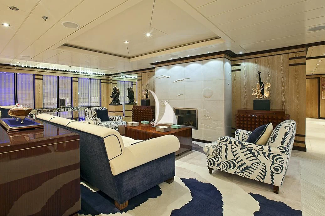 a living room with a blue rug aboard FORCE BLUE Yacht for Charter