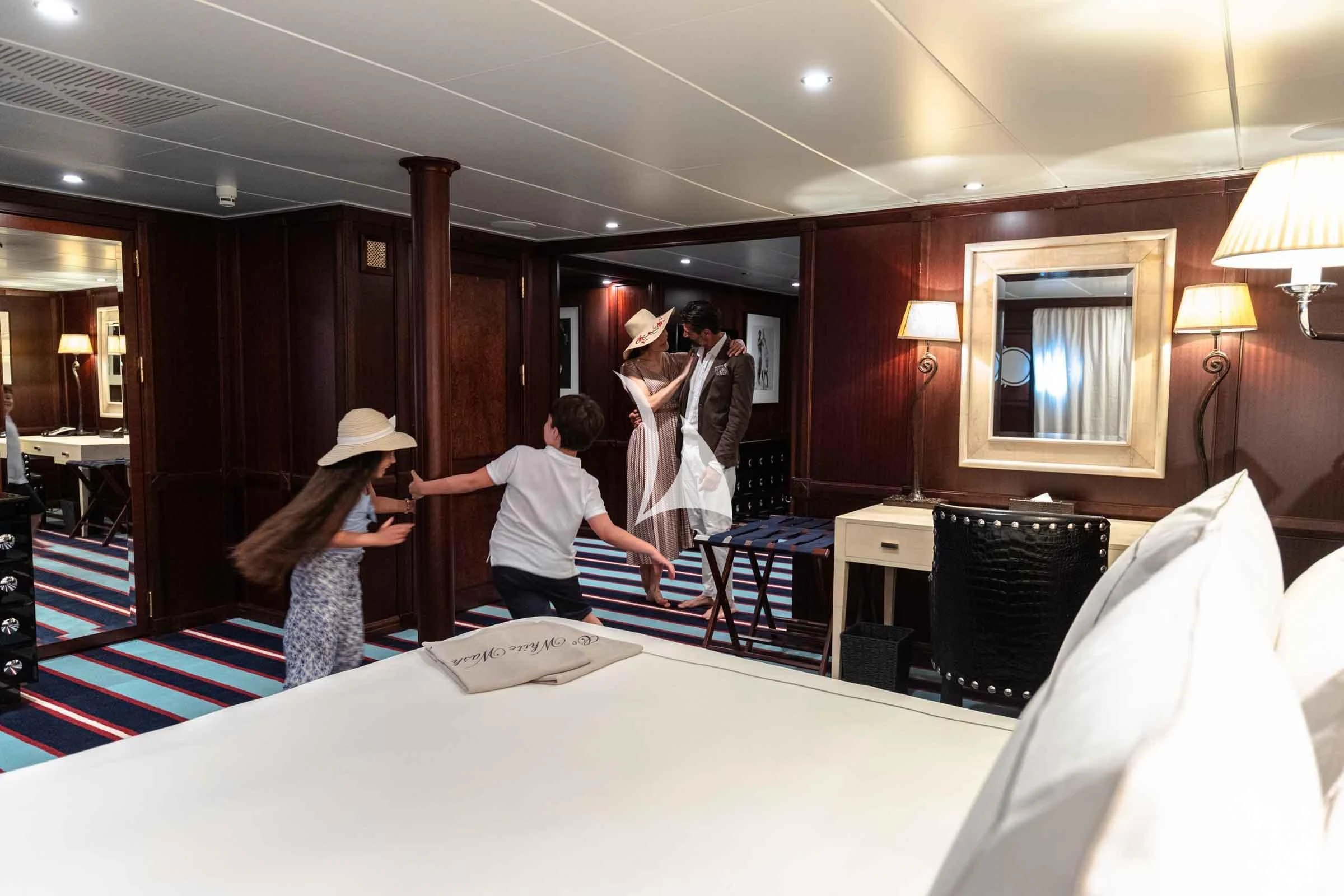 a group of people in a room aboard FORCE BLUE Yacht for Charter