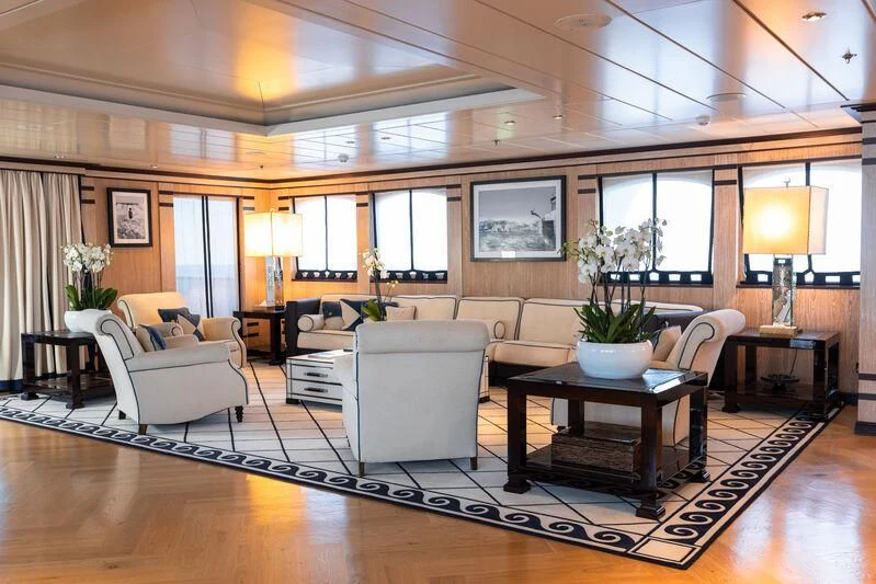 a living room with a large window aboard FORCE BLUE Yacht for Charter