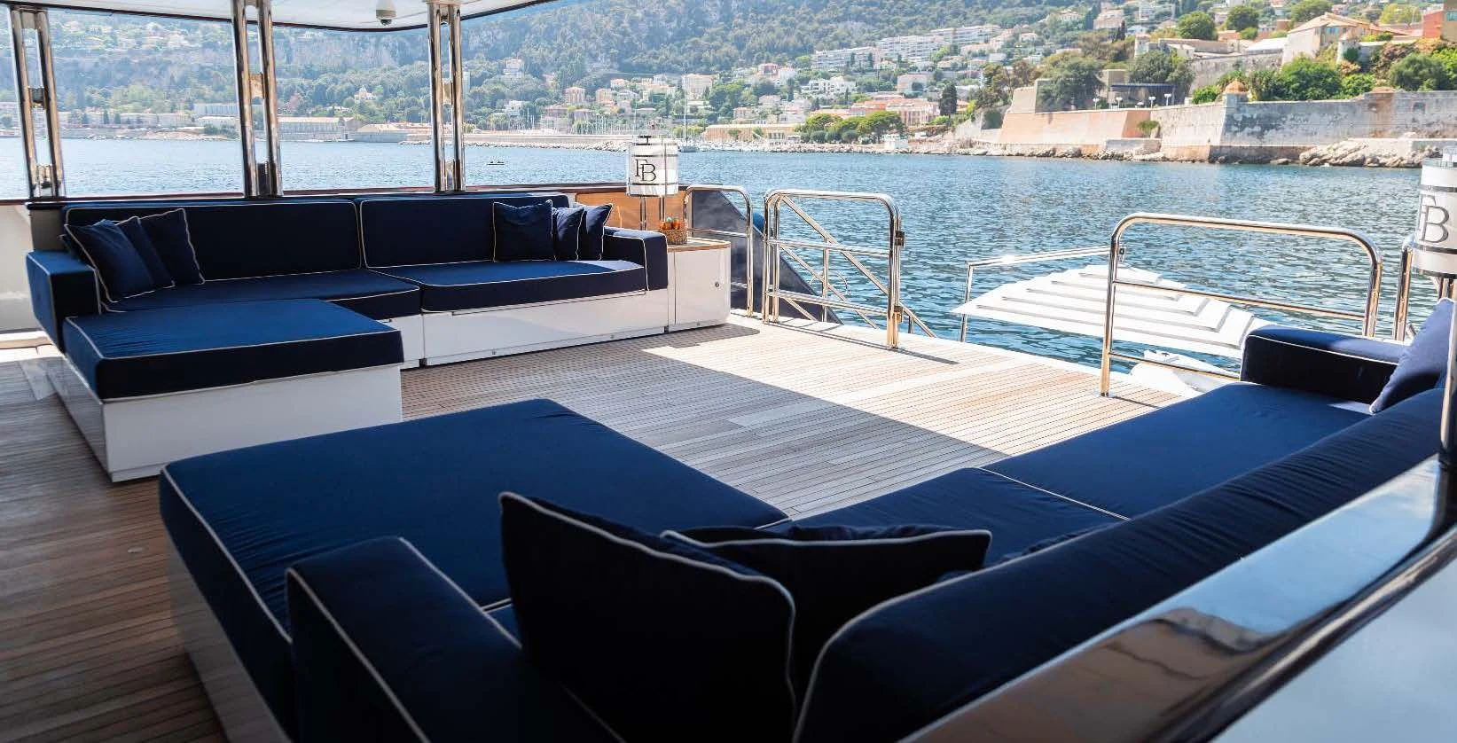 a room with a couch and a pool aboard FORCE BLUE Yacht for Charter