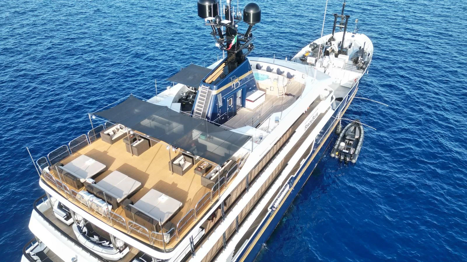 a large ship in the water aboard FORCE BLUE Yacht for Charter