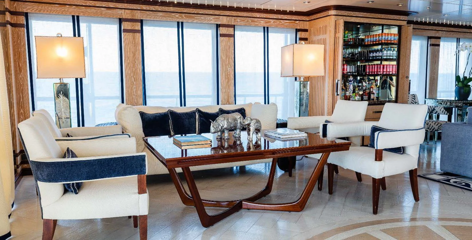 a living room with a large window aboard FORCE BLUE Yacht for Charter