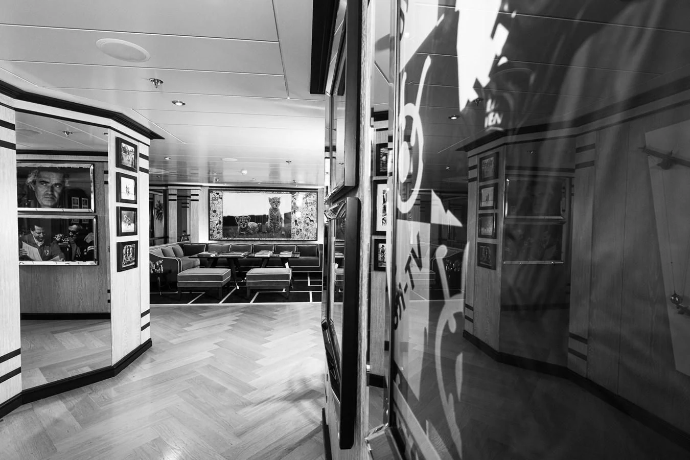 a hallway with chairs and tables aboard FORCE BLUE Yacht for Charter