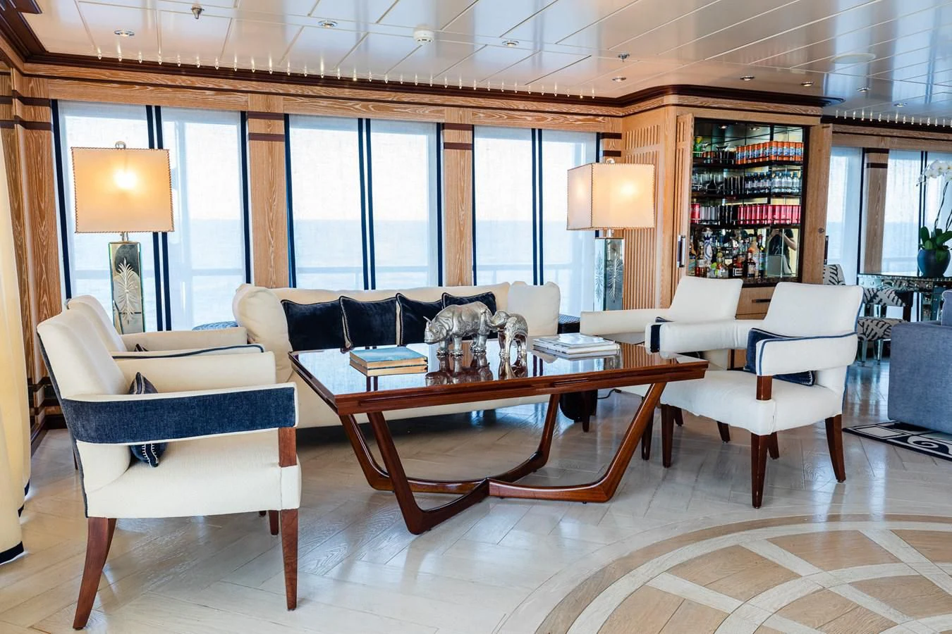 a room with a table and chairs aboard FORCE BLUE Yacht for Charter