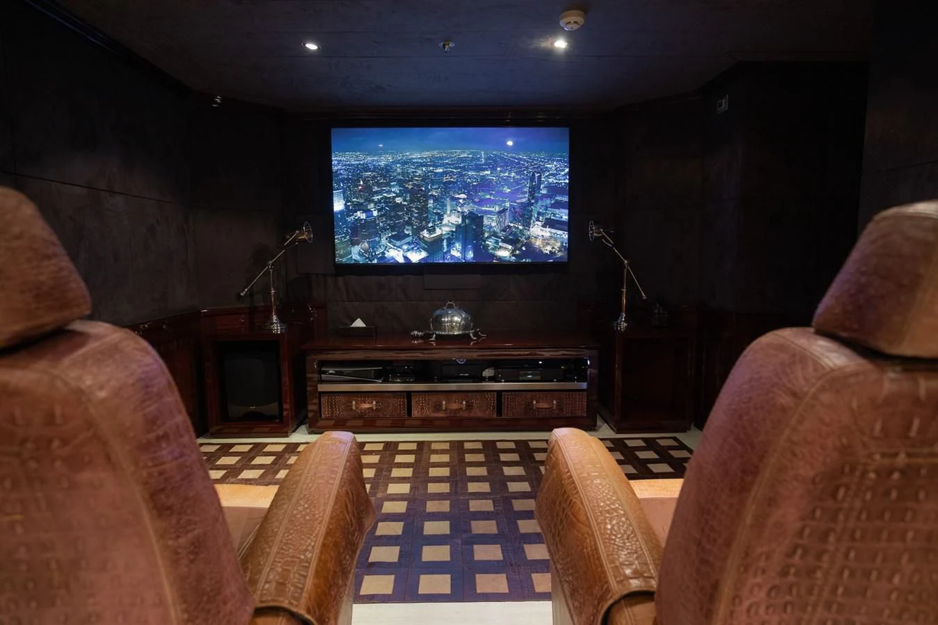 a living room with a tv aboard FORCE BLUE Yacht for Charter
