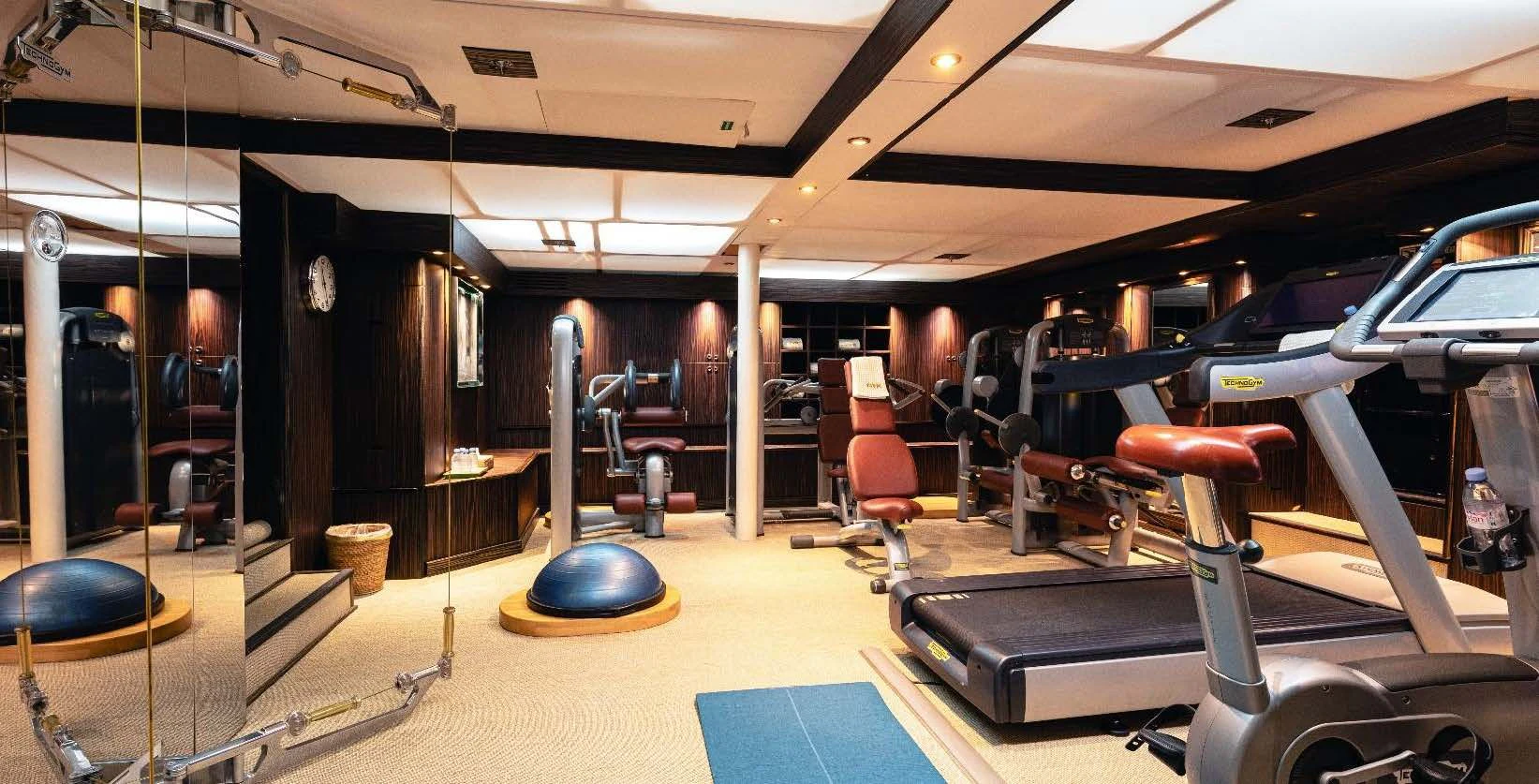 a gym with exercise equipment aboard FORCE BLUE Yacht for Charter