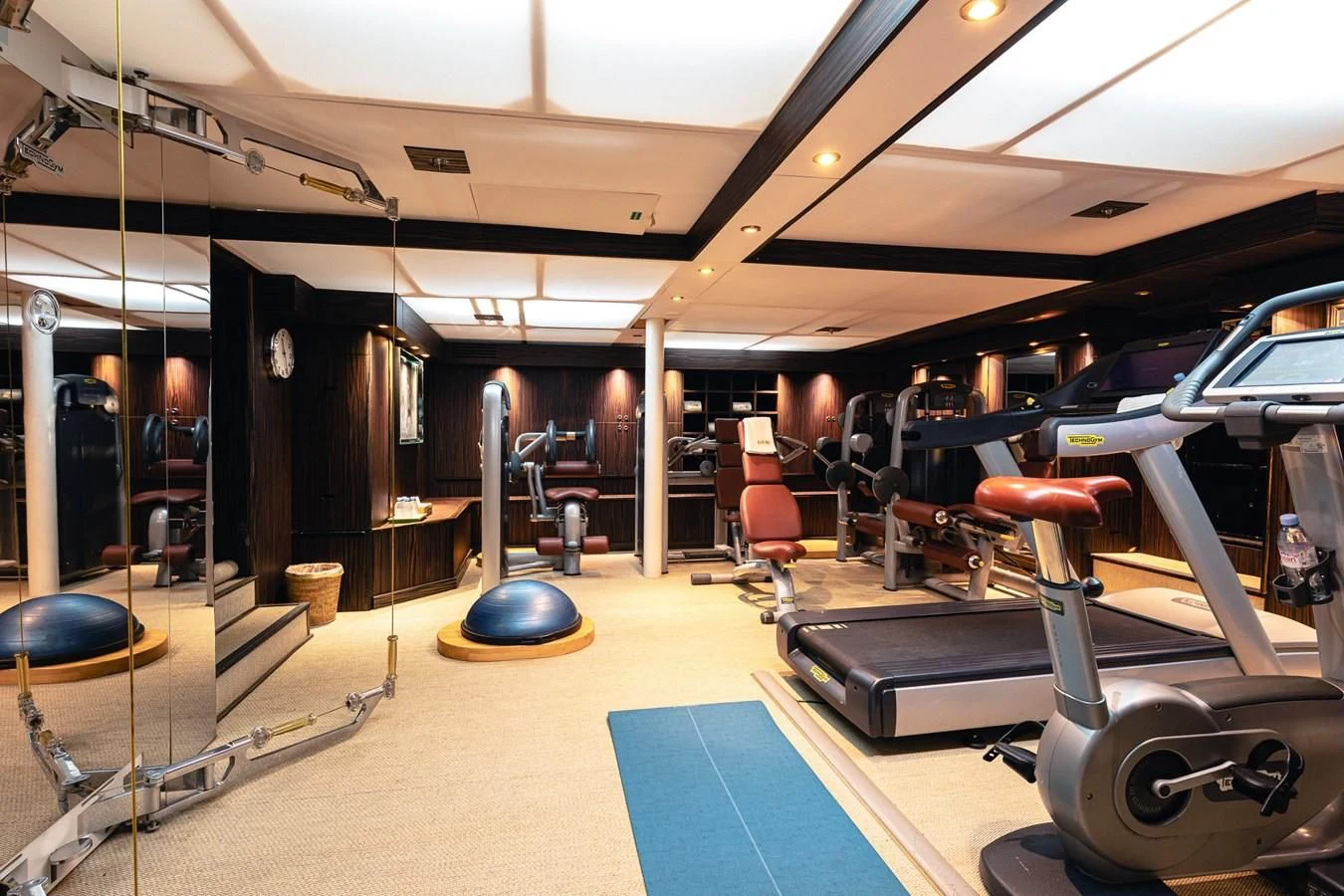 a gym with exercise equipment aboard FORCE BLUE Yacht for Charter
