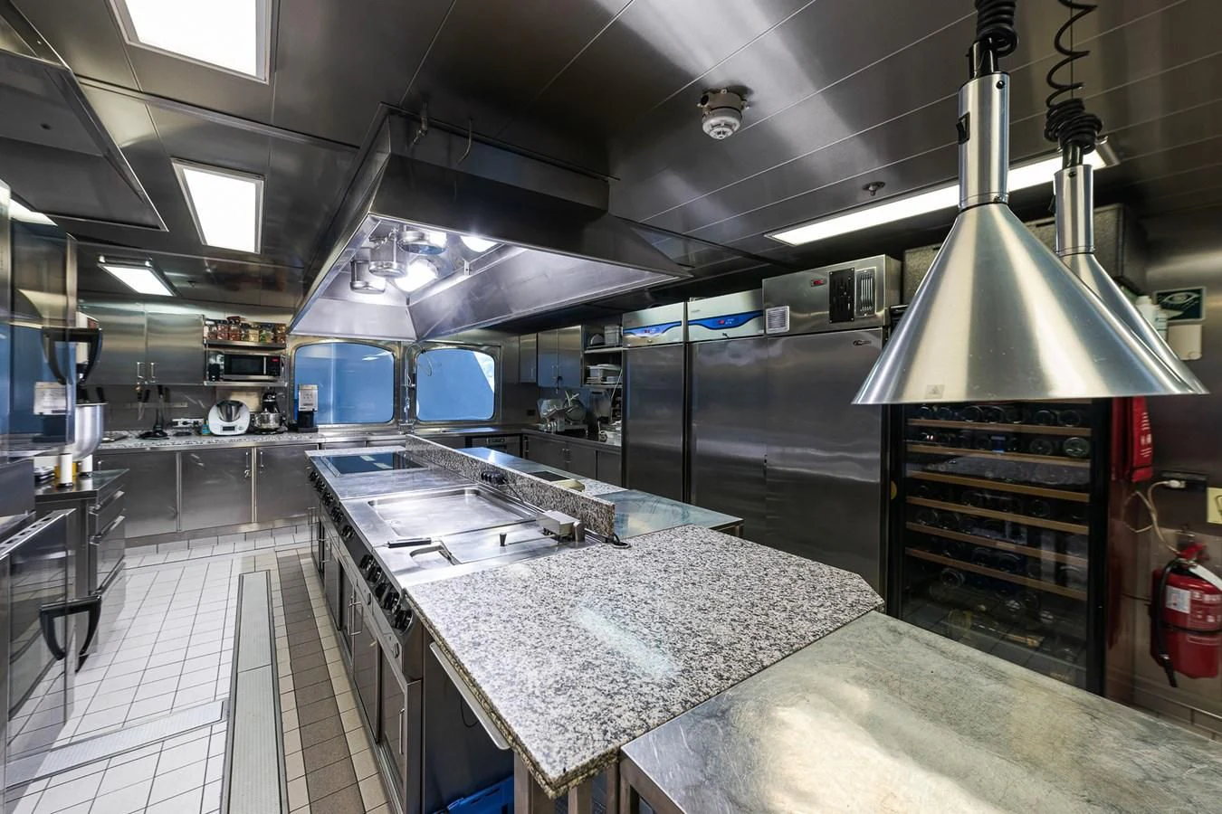 a large kitchen with stainless steel appliances aboard FORCE BLUE Yacht for Charter