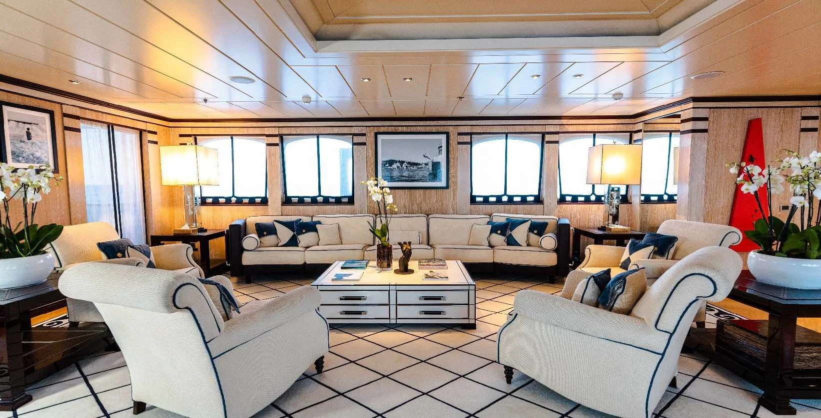 a living room with a couch and a table aboard FORCE BLUE Yacht for Charter