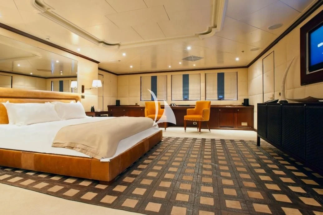 a room with a bed and a tv aboard FORCE BLUE Yacht for Charter