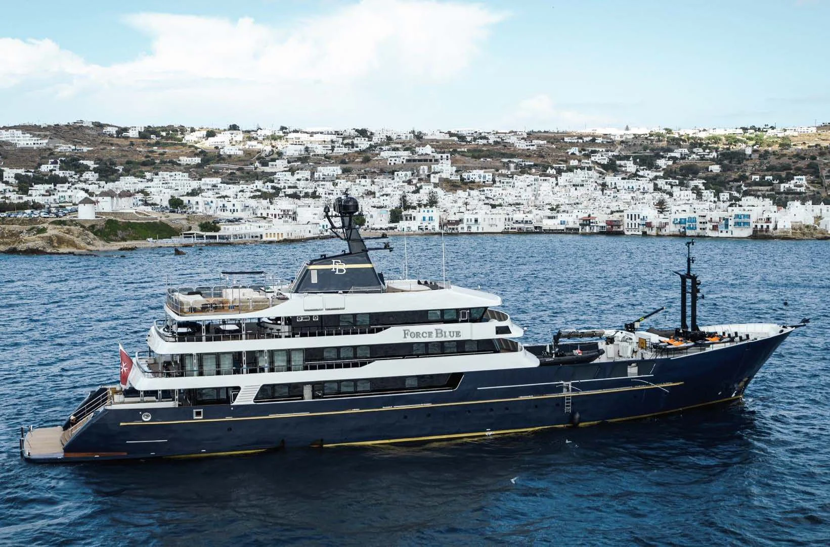a large ship in the water aboard FORCE BLUE Yacht for Charter