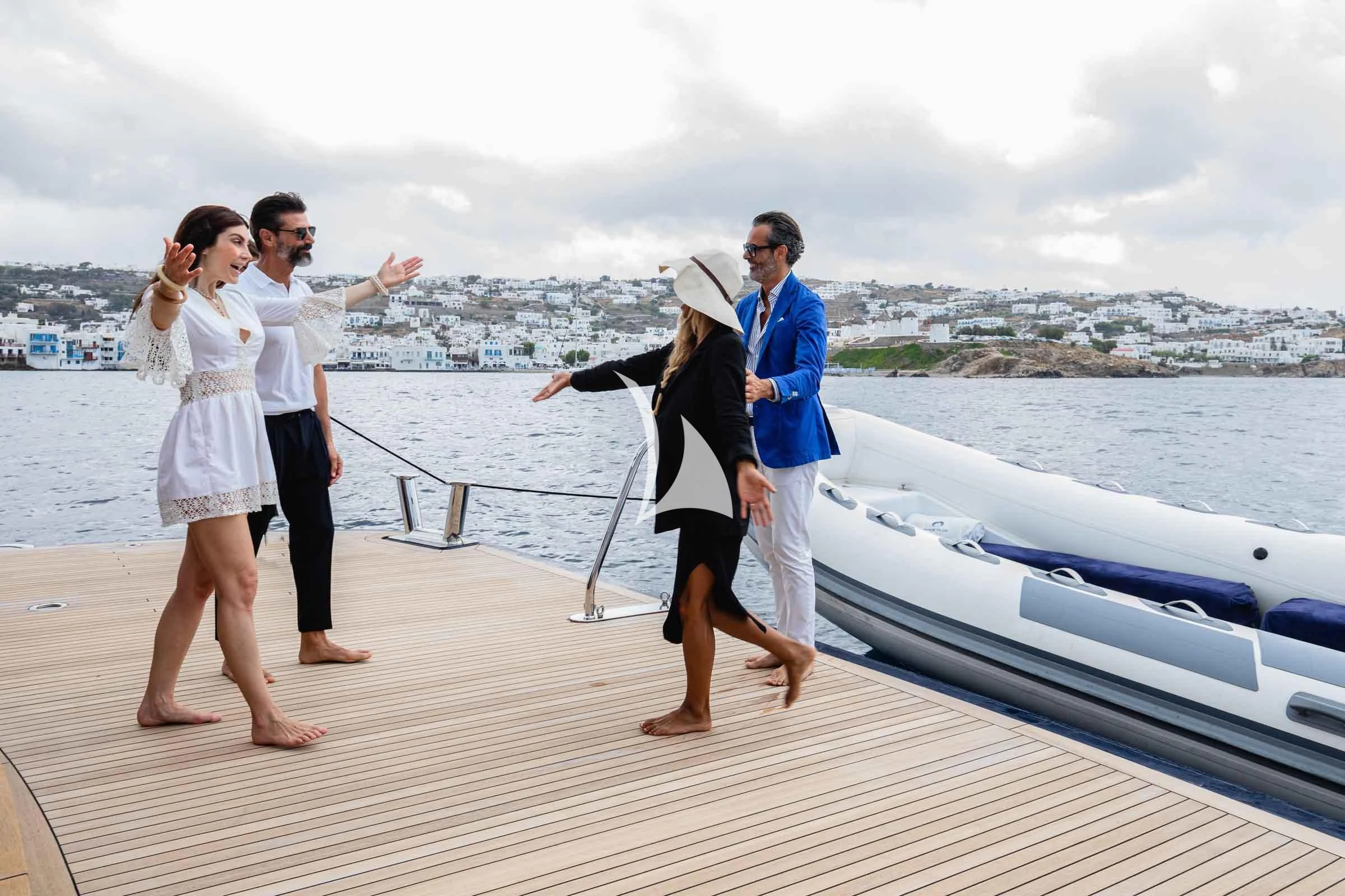 a group of people on a dock aboard FORCE BLUE Yacht for Charter