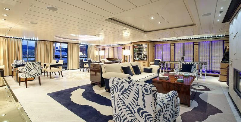 a large living room with a large window aboard FORCE BLUE Yacht for Charter