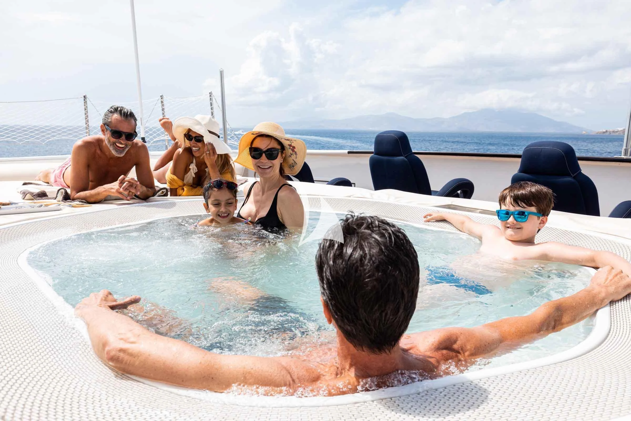 a group of people in a pool aboard FORCE BLUE Yacht for Charter