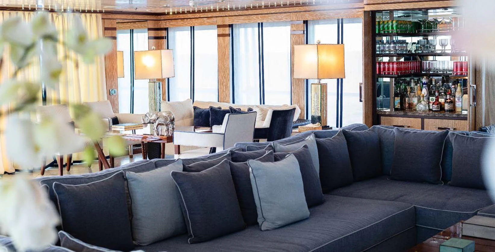 a living room with couches and a table aboard FORCE BLUE Yacht for Charter