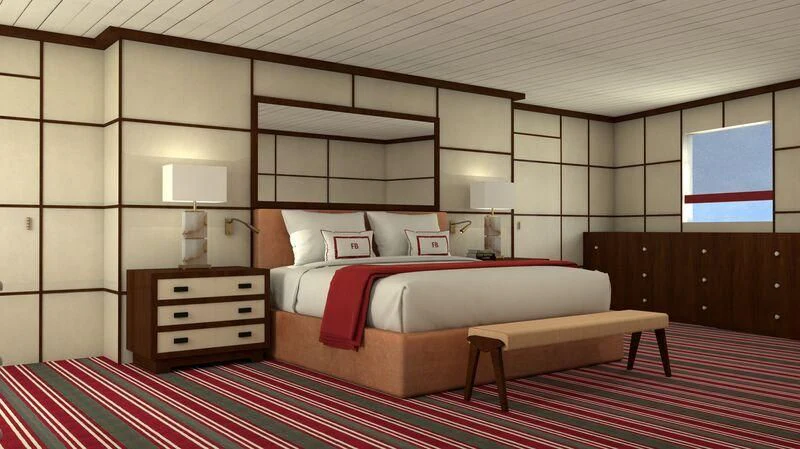a room with a bed and a desk aboard FORCE BLUE Yacht for Charter