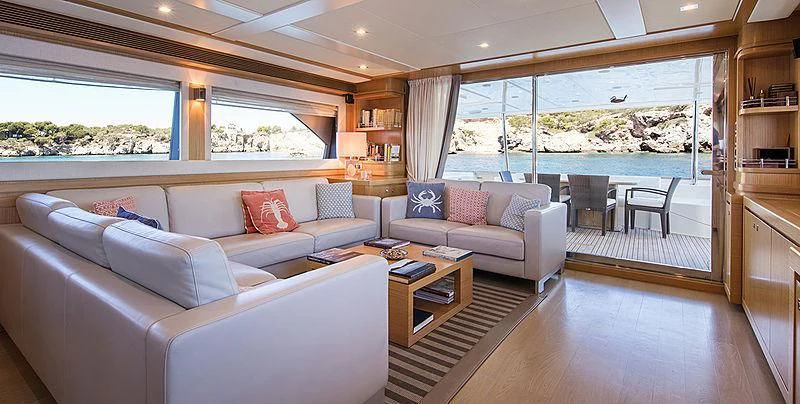 a living room with a large window aboard EOLIA Yacht for Sale